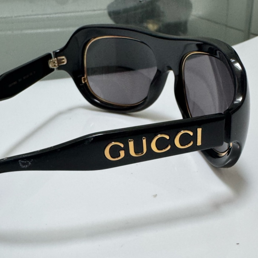 Authentic Gucci Black Sunglasses with Gold Trim